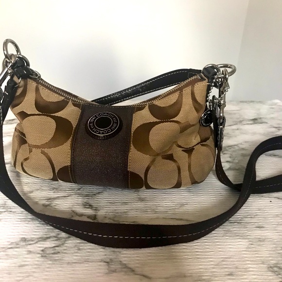 Coach tan canvas crossbody handbag
